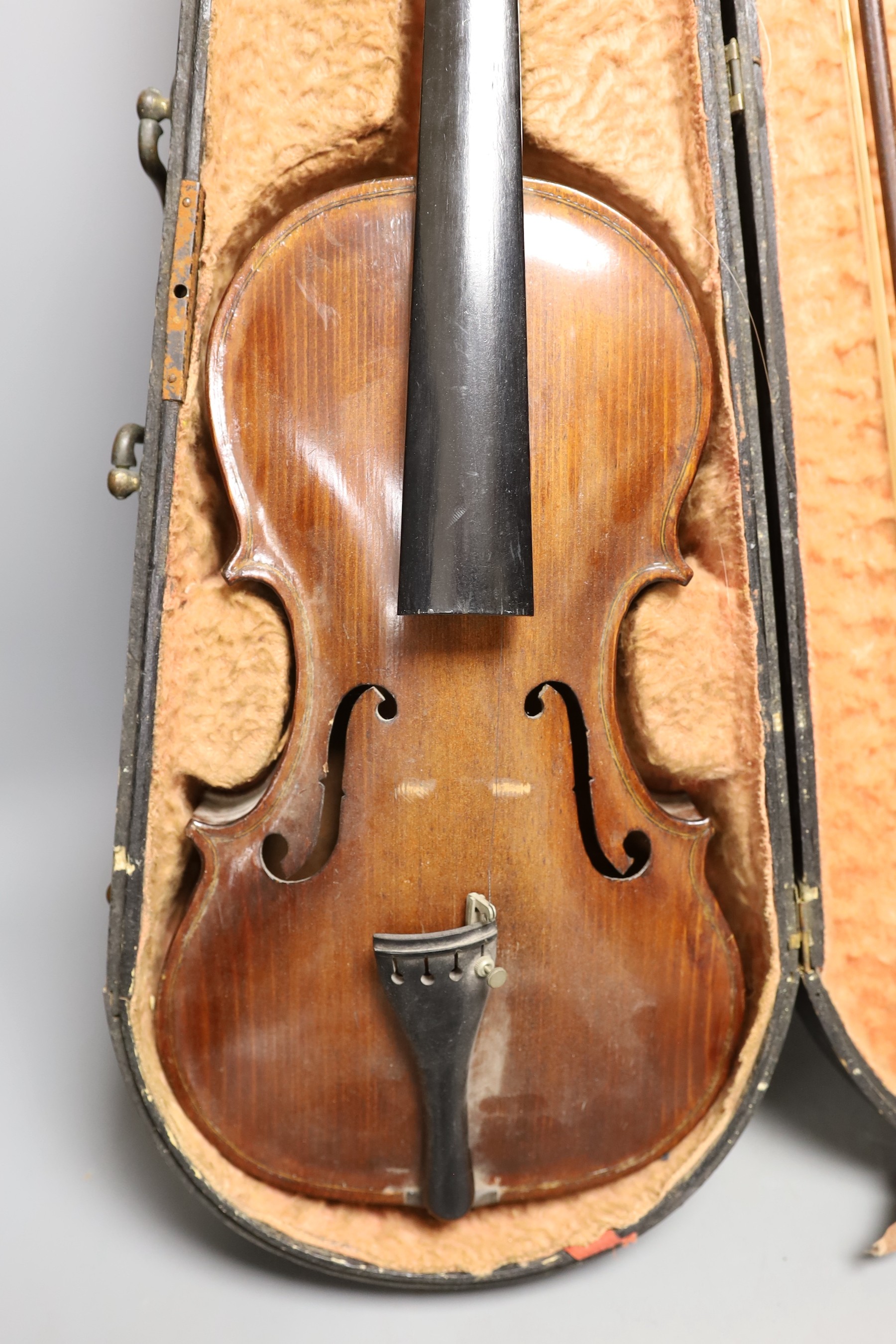 A cased 19th century violin